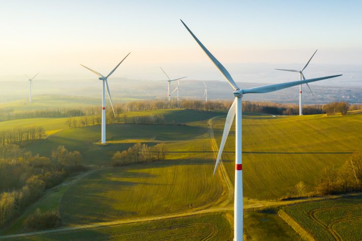 The Land Use Summit will aim to provide a platform for discussing the opportunities and challenges associated with biodiversity recovery in times of rapid global environmental changes. Picture of a wind farm.